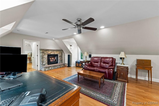 330 River Village Dr, Weems, VA 22576 - living area with lofted ceiling, light wood-type flooring, ceiling fan, recessed lighting, and a stone fireplace
