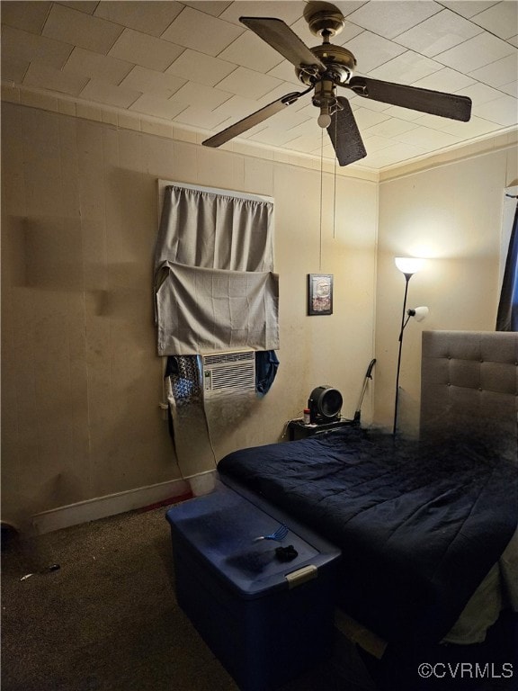 carpeted bedroom featuring cooling unit and ceiling fan