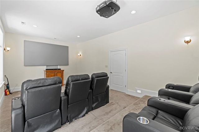 home theater room featuring light carpet