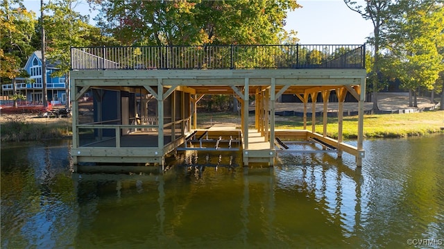 view of dock featuring a water view and boat lift