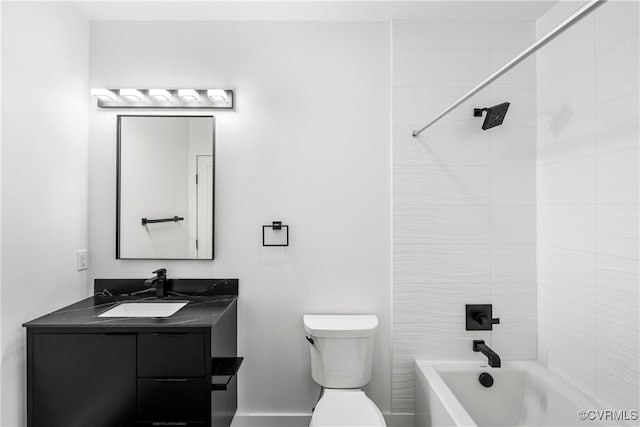 bathroom featuring shower / bath combination, vanity, and toilet