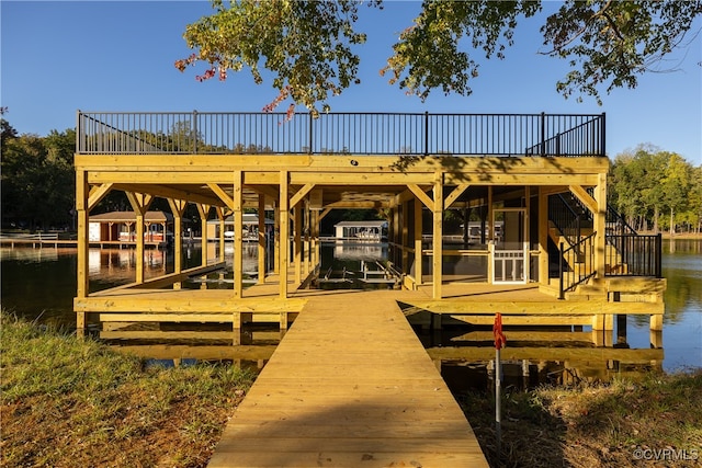 view of dock with a water view and boat lift