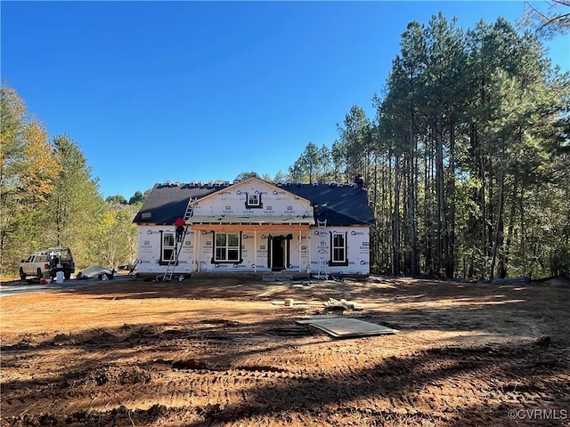 property under construction with covered porch