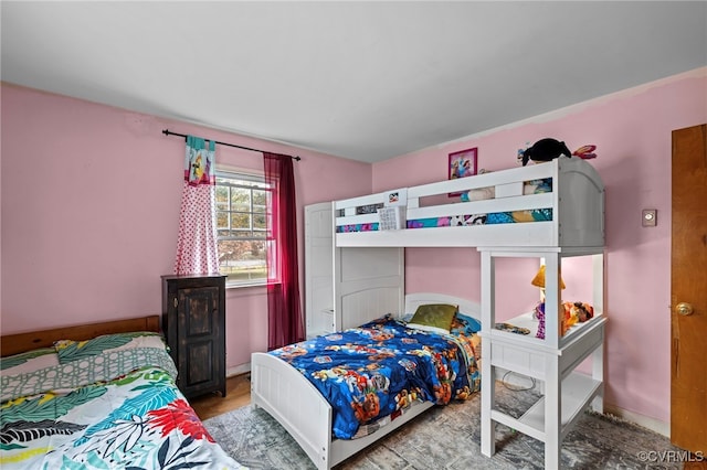 bedroom with light hardwood / wood-style floors