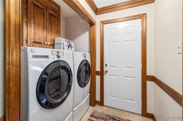 laundry room featuring light tile patterned floors and independent washer and dryer