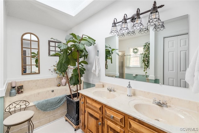 bathroom featuring a tub and vanity