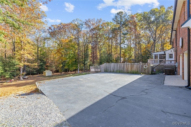 view of patio / terrace featuring a shed