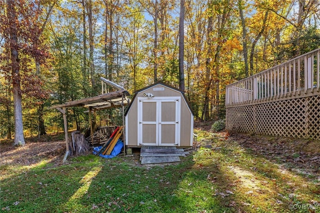 view of outbuilding with a lawn