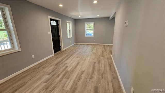 entrance foyer with light hardwood / wood-style flooring