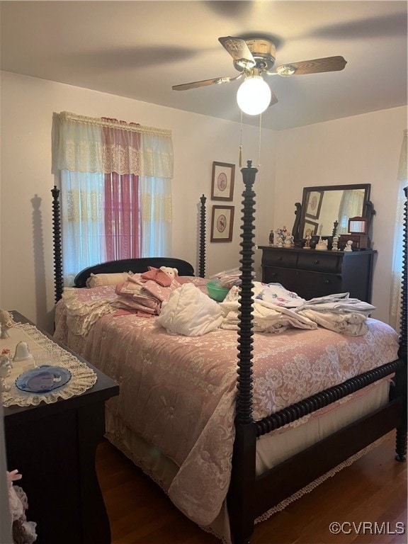 bedroom featuring dark wood-type flooring and ceiling fan