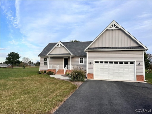 craftsman-style house with a front lawn and a garage