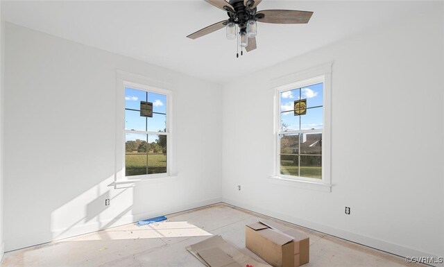 spare room with ceiling fan