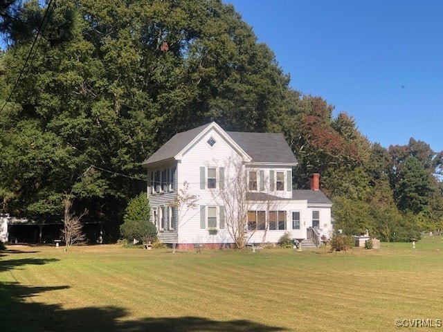 view of front of house with a front yard