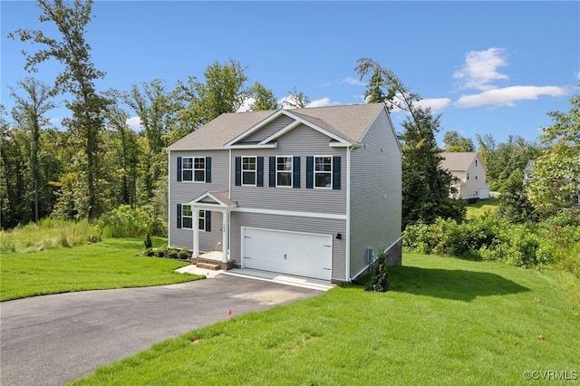 view of front of house featuring a front lawn and a garage