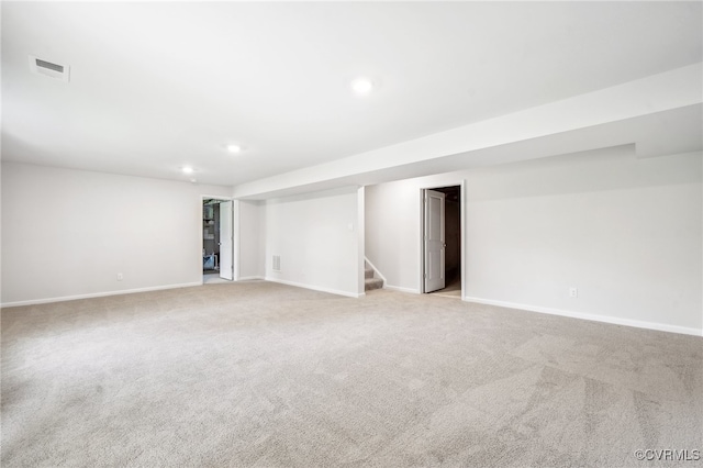 basement with light colored carpet