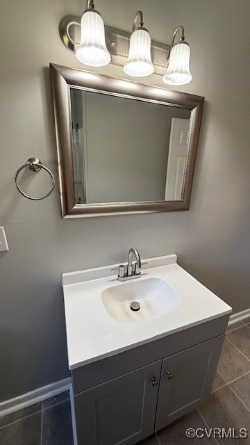 bathroom with vanity and tile patterned floors