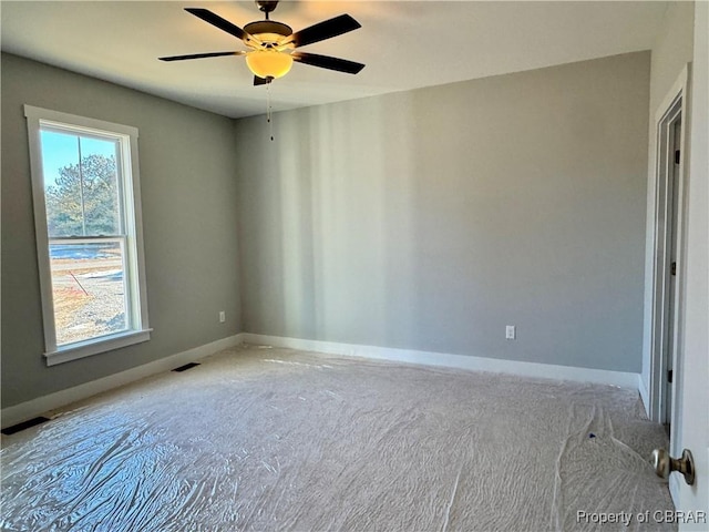 unfurnished room featuring ceiling fan