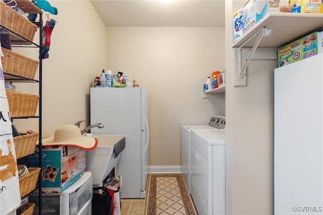 clothes washing area with independent washer and dryer