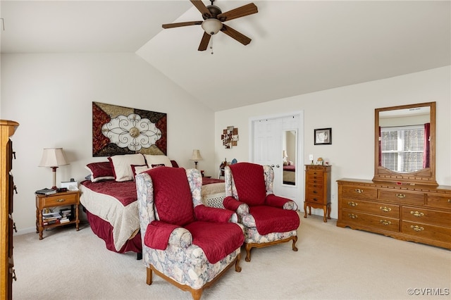 carpeted bedroom featuring ceiling fan and lofted ceiling