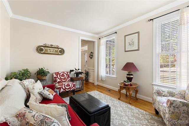 interior space featuring crown molding and hardwood / wood-style flooring