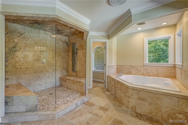 bathroom featuring ornamental molding and shower with separate bathtub