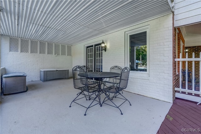 view of patio / terrace featuring a wooden deck