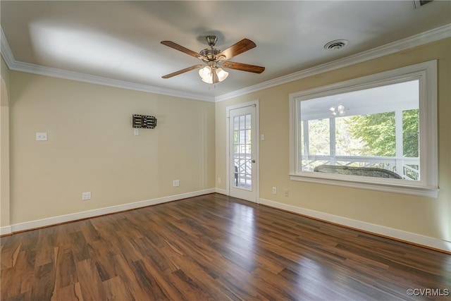 spare room featuring ceiling fan, crown molding, and dark hardwood / wood-style floors