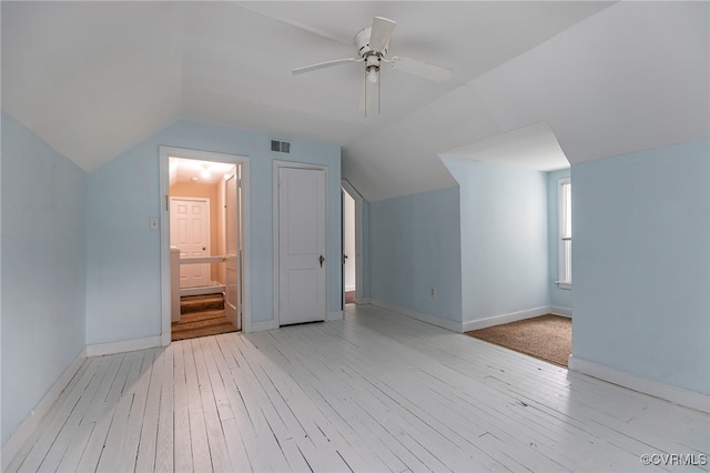 bonus room featuring lofted ceiling, ceiling fan, and light hardwood / wood-style flooring