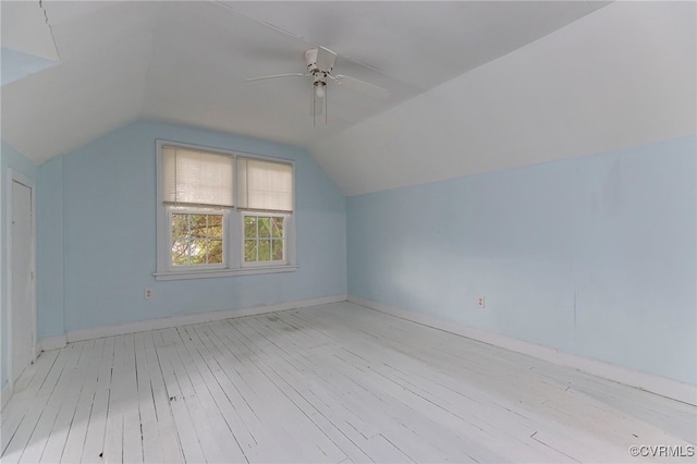 bonus room with ceiling fan, vaulted ceiling, and light hardwood / wood-style flooring