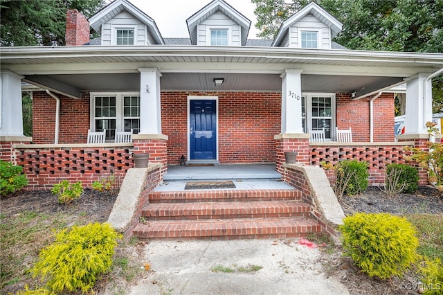 property entrance with a porch