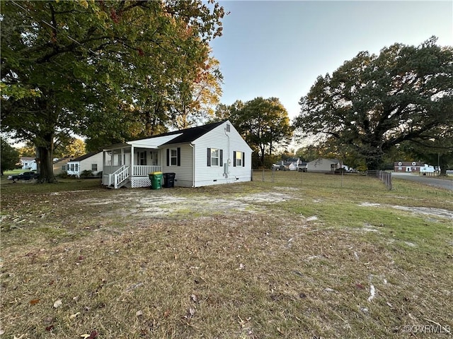 view of home's exterior with covered porch