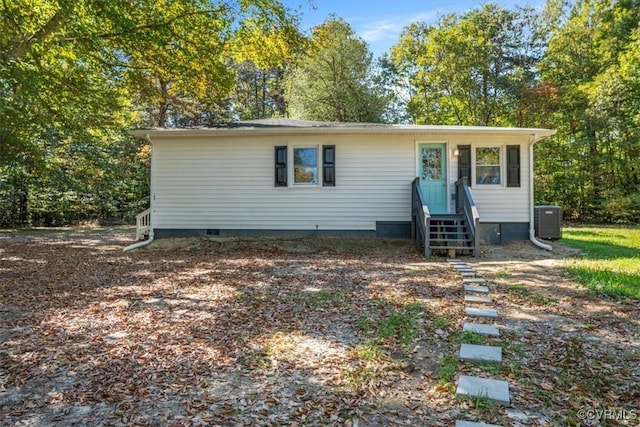 view of front of home featuring cooling unit