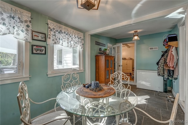 dining room with a wealth of natural light