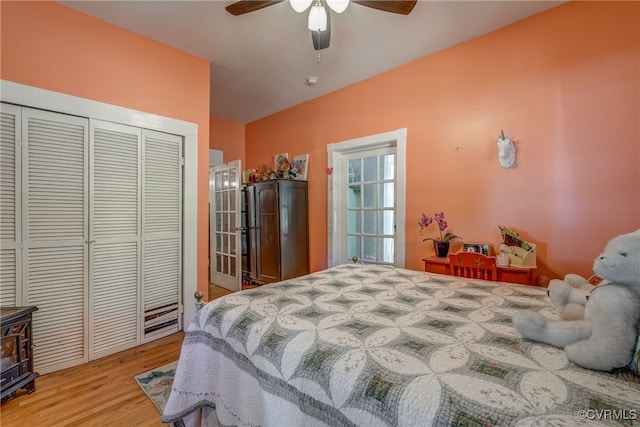 bedroom featuring a closet, ceiling fan, and light hardwood / wood-style flooring