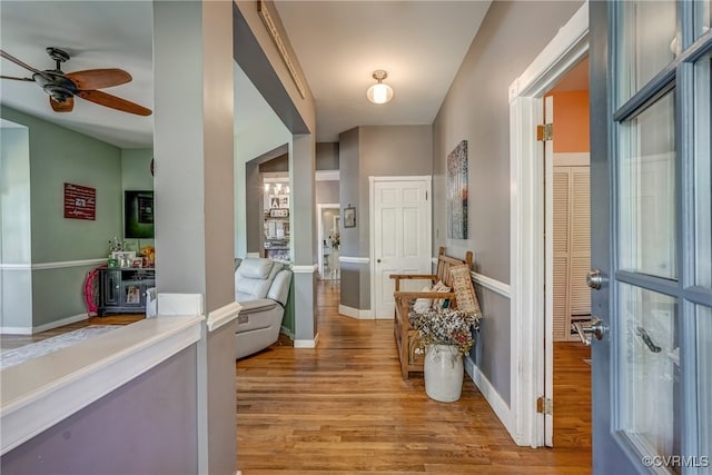 entrance foyer with light wood-type flooring and ceiling fan