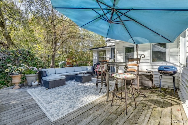 deck with an outdoor hangout area