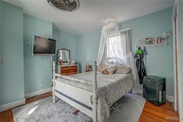 bedroom featuring hardwood / wood-style floors