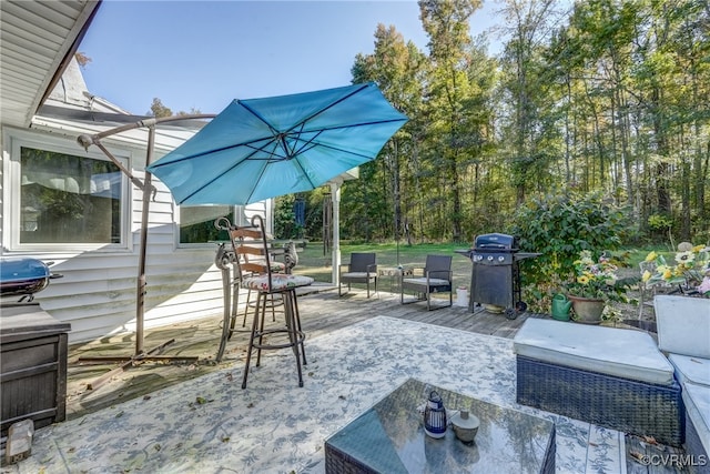 view of patio featuring a deck and area for grilling