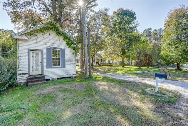 exterior space with a front yard