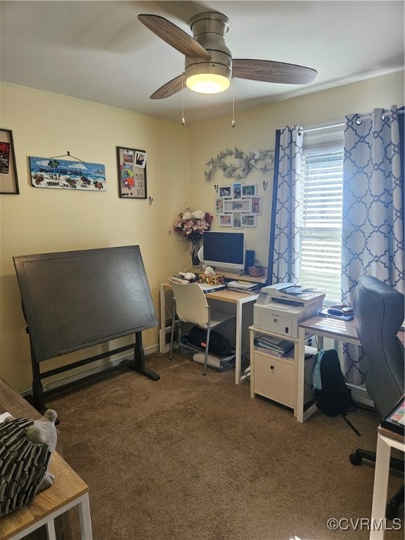 office space with ceiling fan and carpet flooring