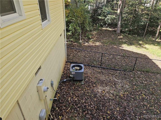 view of yard with central AC