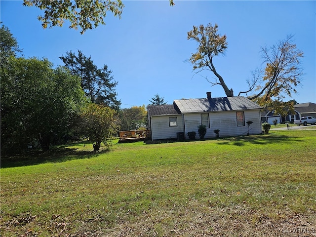 view of yard with a deck