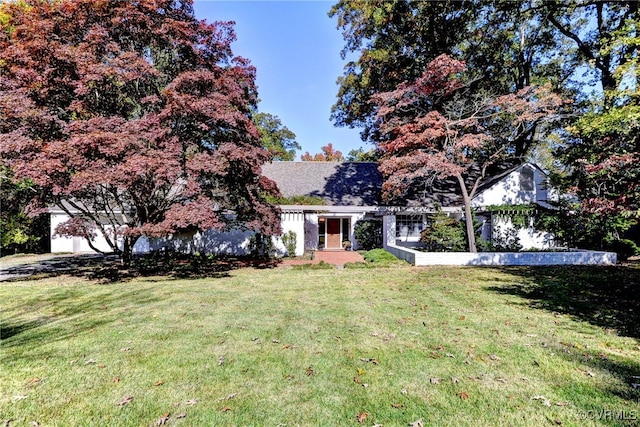 view of front of home with a front yard