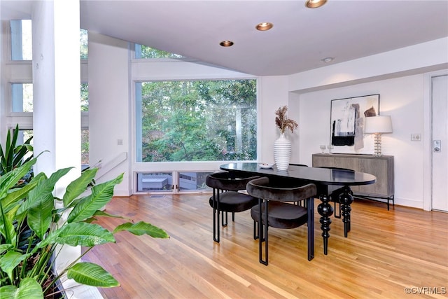 dining area with a healthy amount of sunlight and light wood-type flooring