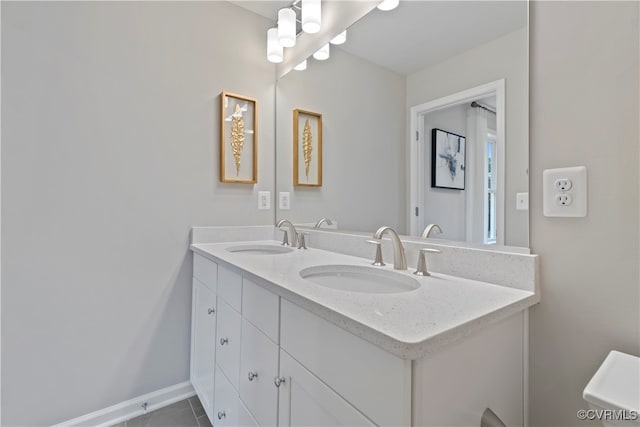 bathroom with vanity and tile patterned floors