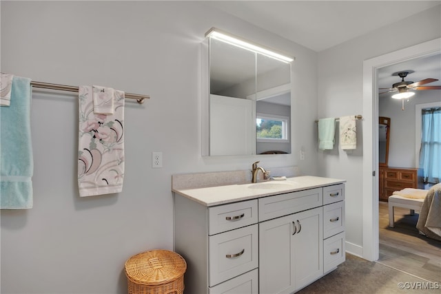 bathroom with vanity, wood-type flooring, and ceiling fan