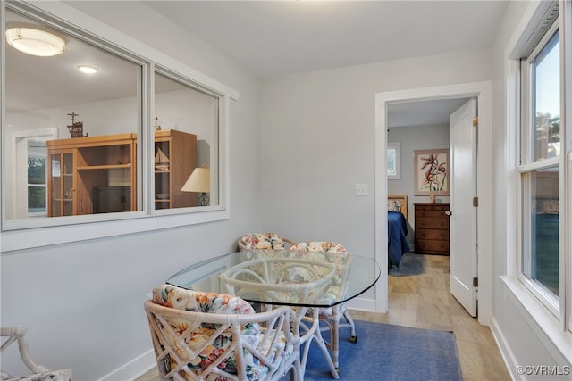 dining space featuring light hardwood / wood-style flooring