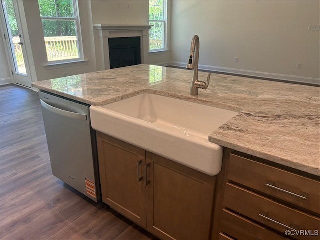 2050 Swiss Ln, Hayes, VA 23072 - kitchen featuring dishwasher, dark wood-style flooring, light stone counters, and plenty of natural light
