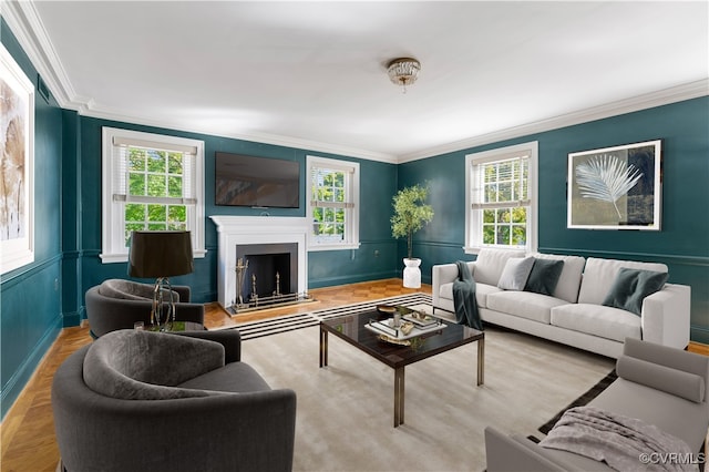 living room featuring a wealth of natural light, crown molding, and light parquet floors