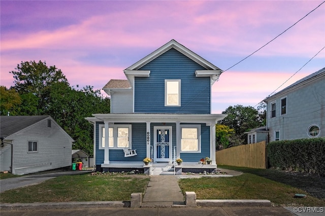 front facade with a yard